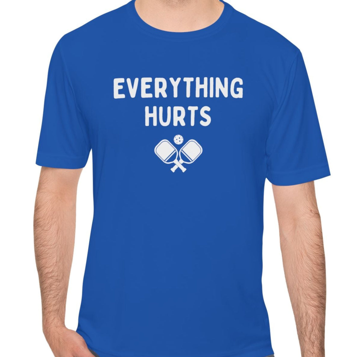 man wearing a royal blue performance pickleball tee
