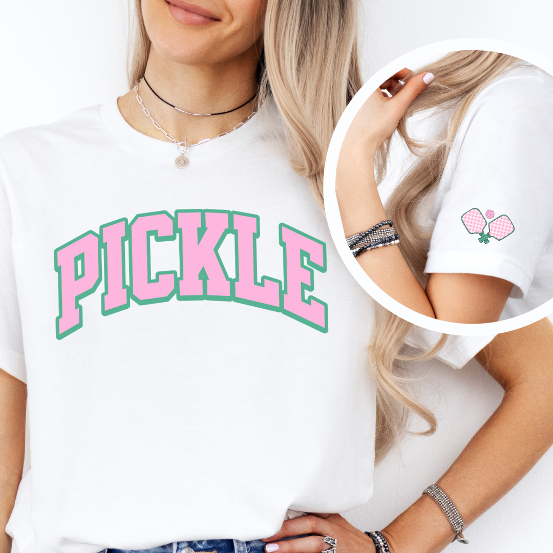 woman_wearing_white_pickleball_t-shirt_with_sleeve_graphic
