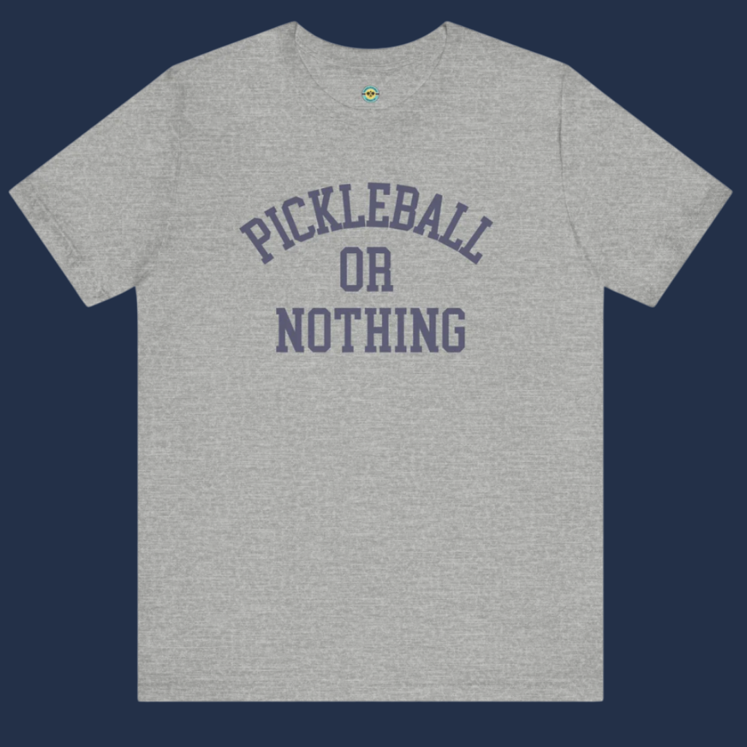 woman wearing a light blue pickleball performance tee that says play more pickleball worry less