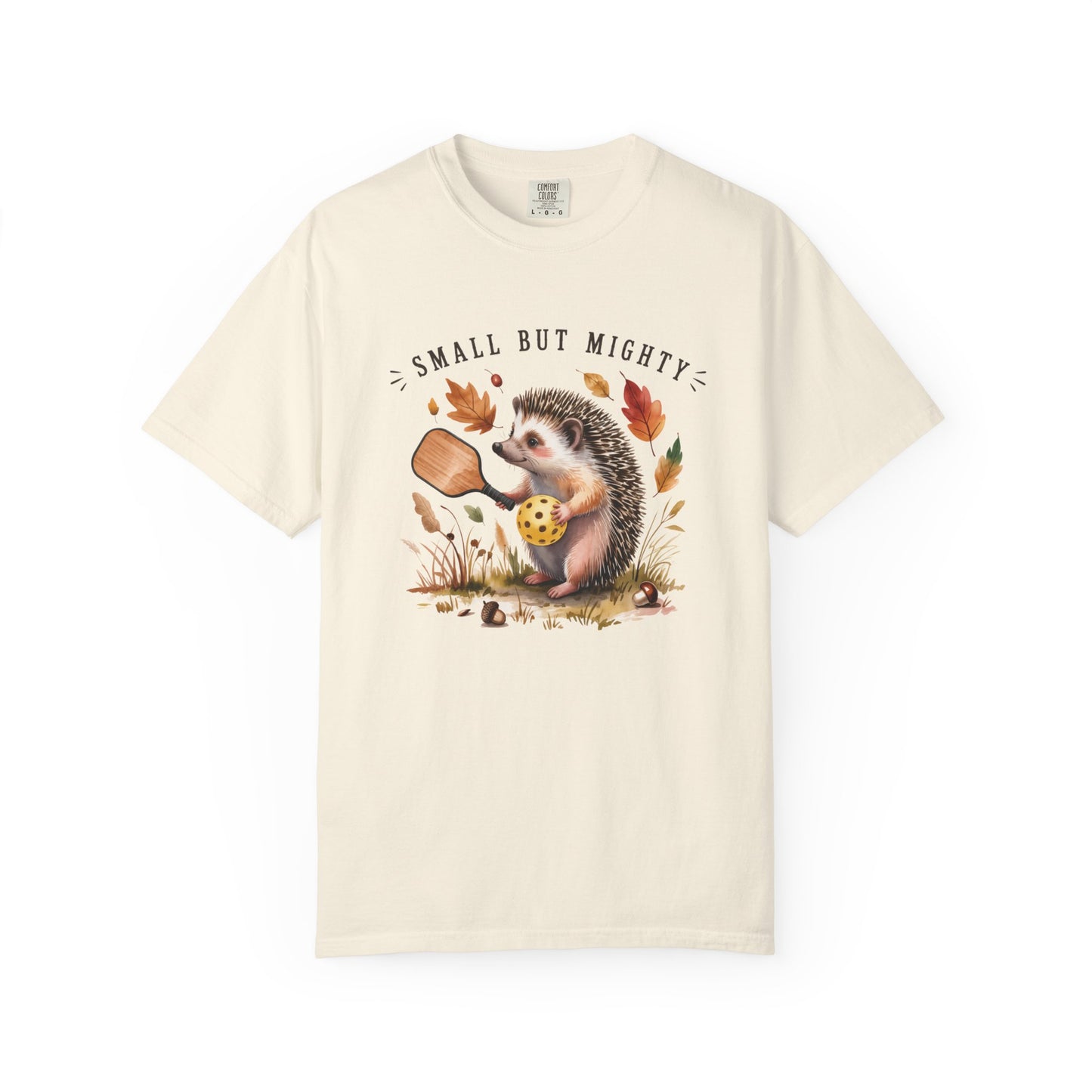 Ivory pickleball t-shirt with hedgehog graphic and 'Small But Mighty' text on a white background