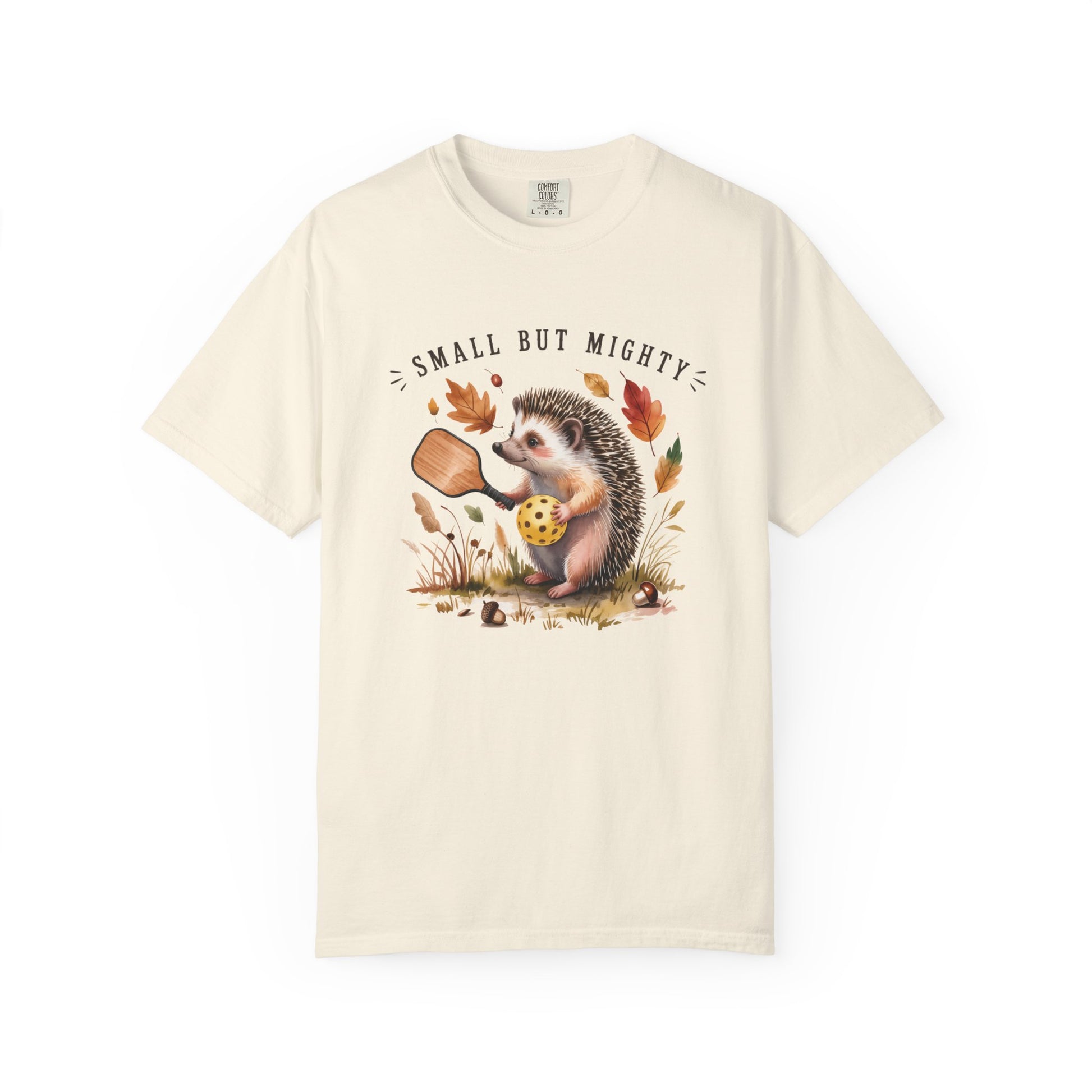 Ivory pickleball t-shirt with hedgehog graphic and 'Small But Mighty' text on a white background