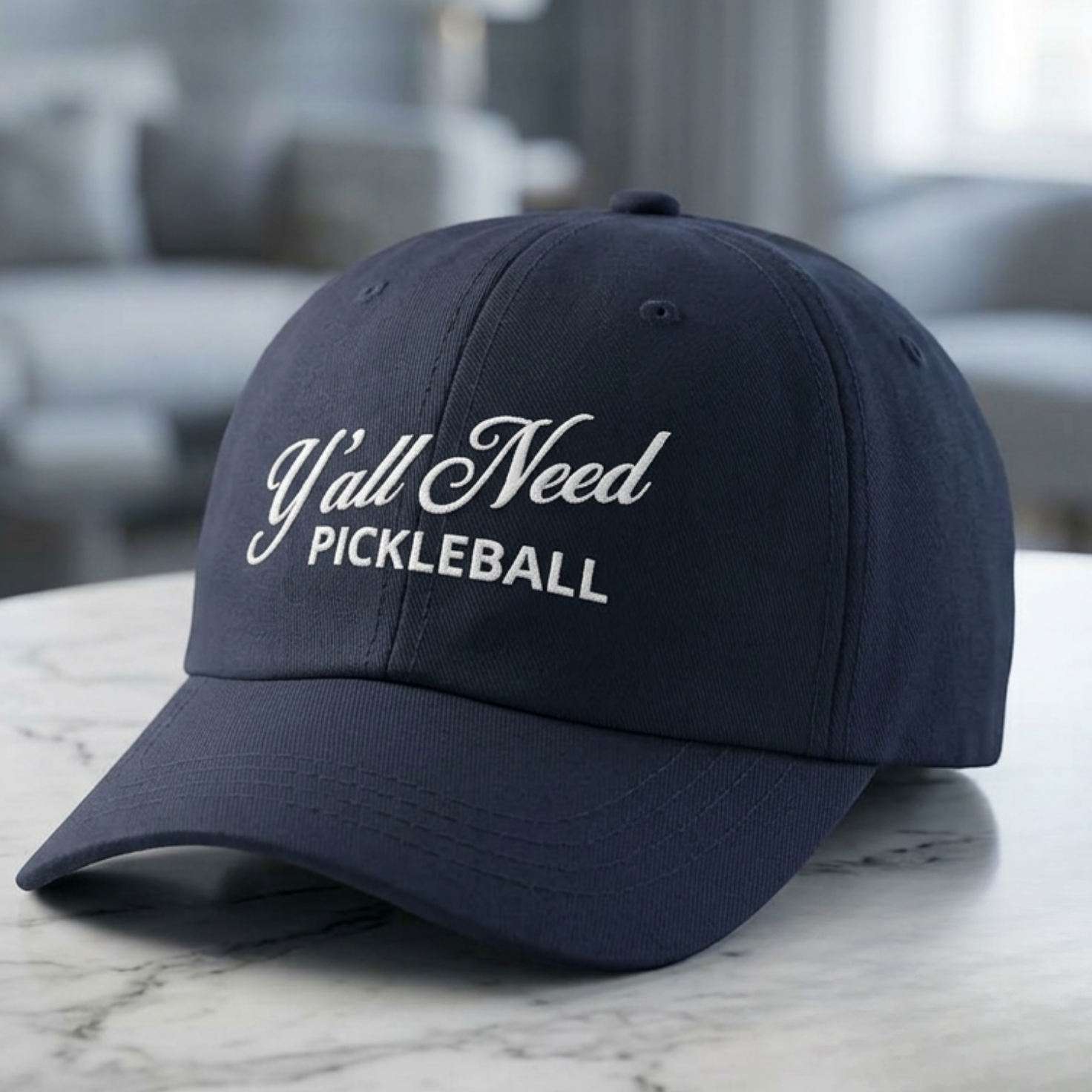 Navy blue pickleball cap with 'Y'all Need Pickleball' embroidered text