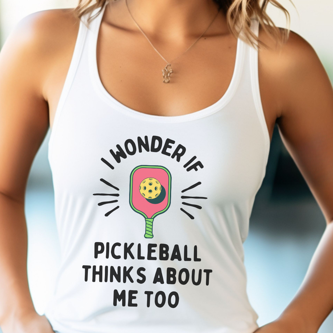woman wearing a white pickleball racerback tank